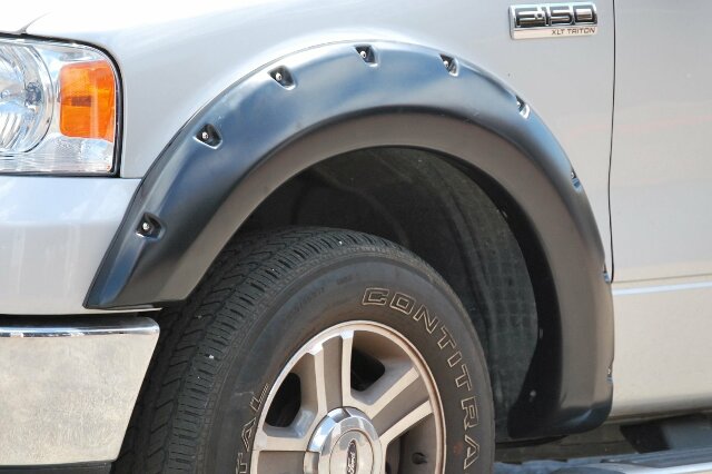 Lund RX310S Elite Series Black Rivet Style Standard Front and Rear Fender Flare - 4 Piece