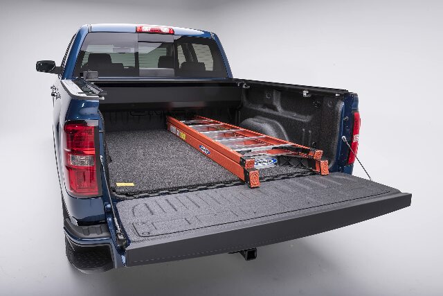RealTruck BedRug BedMat | Compatible with Chevrolet Silverado/GMC Sierra 2500, 3500 HD w/Out Multi - Pro Tailgate, 98.2 Bed, Models w/Non Liner/Spray-in | Charcoal Grey, BMC20LBS 2020-2025