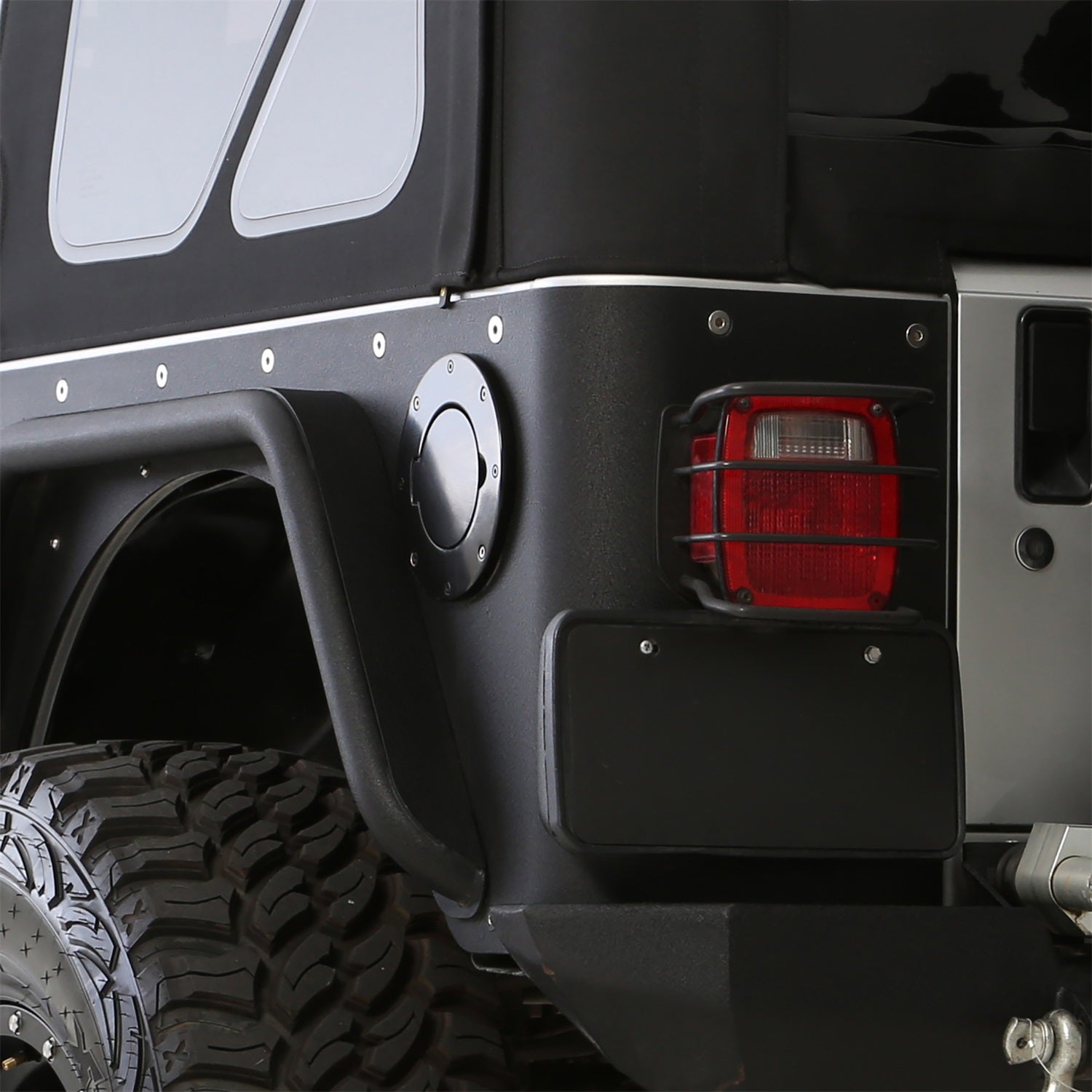 Smittybilt 75006 Billet Style Gas Cover Fits 97-06 Wrangler (TJ)