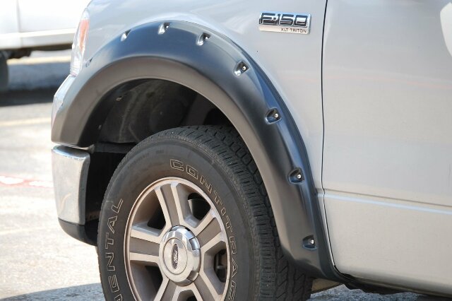 Lund RX310S Elite Series Black Rivet Style Standard Front and Rear Fender Flare - 4 Piece