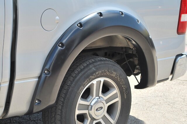 Lund RX310S Elite Series Black Rivet Style Standard Front and Rear Fender Flare - 4 Piece