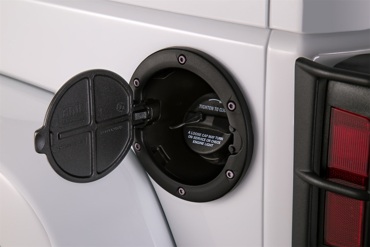 AMP Research 73000-01A Fuel Door Fits 07-18 Wrangler (JK)
